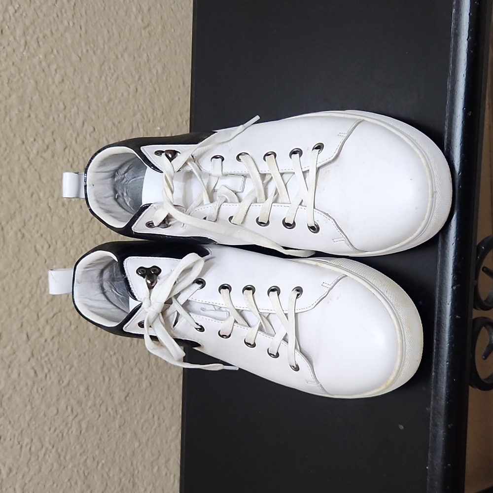 White and Black athletic men leather shoes.
